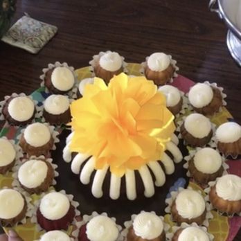 Nothing Bundt Cakes - custom assortment of bundtinis with an 8inch chocolate chocolate chip cake with a golden yellow bow - Bakeries Near Me - Shrewsbury, New Jersey Nothing Bundt Cakes - custom assortment of bundtinis with an 8inch chocolate chocolate chip cake with a golden yellow bow - Bakeries Near Me - Shrewsbury, New Jersey