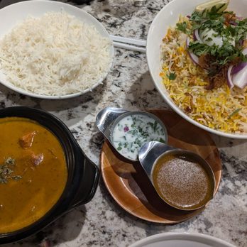 Paradise Street Eats & Biryani - Bottom left: Chicken Tikka Masala Top right: Lamb Dum Biryani - Indian Near Me - Dearborn, Michigan