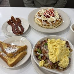 French toast, Meat Lover's Skillet, cinnabun pancakes, side of crispy bacon