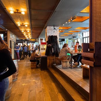 Treadwell Park - people sitting at tables in a restaurant - Bars Near Me - New York, New York Treadwell Park - people sitting at tables in a restaurant - Bars Near Me - New York, New York