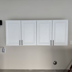 Vadym Handyman - Hung cabinets in the garage for organized storage and a tidy workspace.