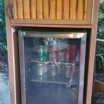 Discovery Cove - Mini fridge (stocked with beer, pop and wine that we wanted that kept getting refilled) - Amusement Parks Near Me - Orlando, Florida