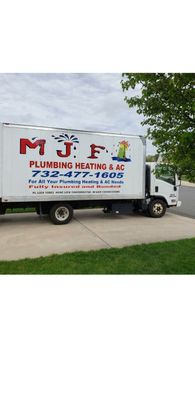 M J F Plumbing & Heating Logo