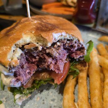 The Whiskey - Thw Elk burger after couple of bites. - American Near Me - Orlando, Florida