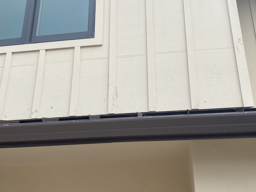 Slide of Signature Rain Gutters & Metal Works