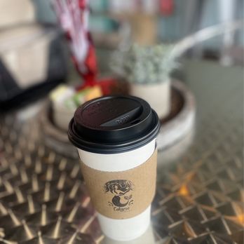 Calypso Coffee Bar - a cup of coffee on a table - Coffee & Tea Near Me - Apopka, Florida Calypso Coffee Bar - a cup of coffee on a table - Coffee & Tea Near Me - Apopka, Florida