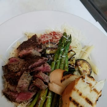 Perfect 10 Highland - steak, asparagus, and bread - Strip Clubs Near Me - Austin, Texas