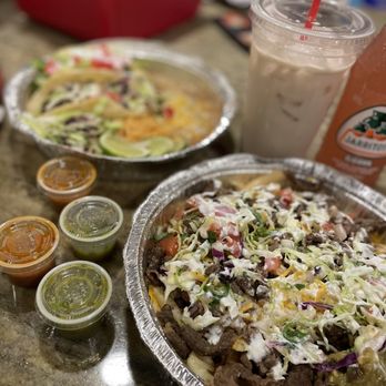 Laz's Tacos - Carne Asada fries, taco plate(shrimp, pork and chicken) and horchata. - Food Trucks Near Me - Issaquah, Washington Laz's Tacos - Carne Asada fries, taco plate(shrimp, pork and chicken) and horchata. - Food Trucks Near Me - Issaquah, Washington