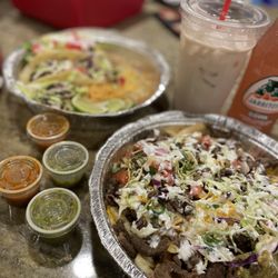 Laz's Tacos - Carne Asada fries, taco plate(shrimp, pork and chicken) and horchata.