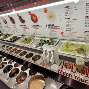 Haidilao Hotpot Flushing - DIY Sauce bar, with red porridge and herbal jelly dessert. - Hot Pot Near Me - Flushing, New York