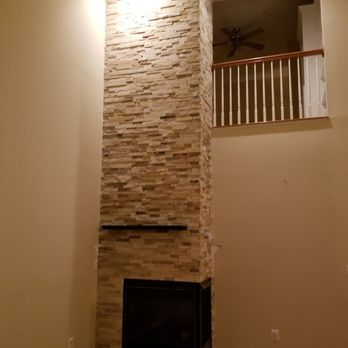 AAA Kitchen and Bath US - Over the fireplace natural stone (stack stone) installation done in Ellicott City, MD. - General Contractors Near Me - Columbia, Maryland