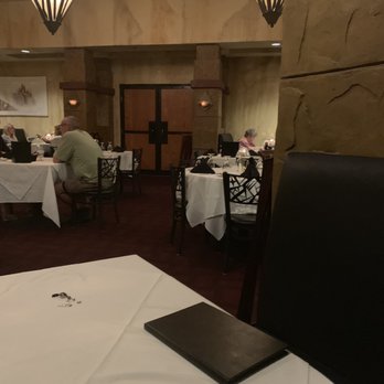 River Willow - a dining room with tables and chairs - Steakhouses Near Me - Parker, Arizona River Willow - a dining room with tables and chairs - Steakhouses Near Me - Parker, Arizona