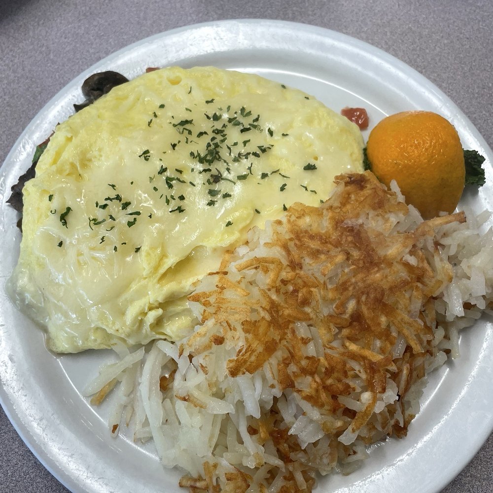 Vegetarian omelette with hash-browns Vegetarian omelette with hash-browns