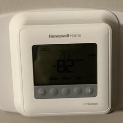Tim & Sons Services Heating and Cooling - New Honeywell (even added a plate behind it so no paint touch up needed).