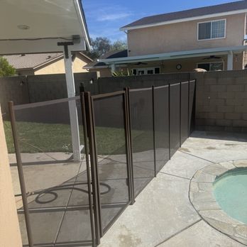 Summerfield Pool Safety  - 5ft brown pool fence - Fences & Gates Near Me