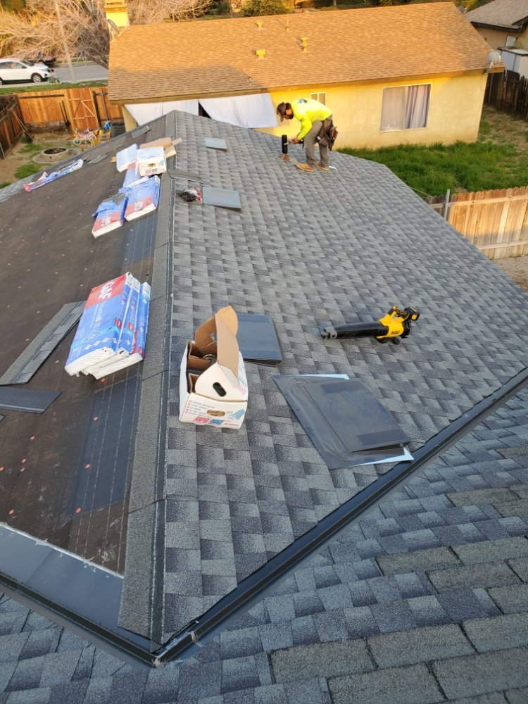 Slide of Eleazars Roofing