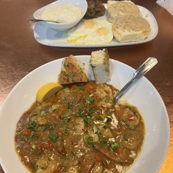 Another Broken Egg Cafe - Shrimp and grits and my friend had the biscuit and gravy. - Breakfast & Brunch Near Me - Nashville, Tennessee Another Broken Egg Cafe - Shrimp and grits and my friend had the biscuit and gravy. - Breakfast & Brunch Near Me - Nashville, Tennessee