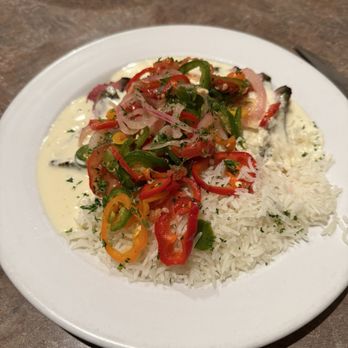 Four Roses Cafe - Chili Rubbed Flank Steak w/ Gorgonzola Cream & Jalapeño Relish - New American Near Me - Plainwell, Michigan