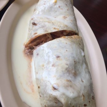 Tony's Tacos - Shredded chicken burrito - Mexican Near Me - Normal, Illinois Tony's Tacos - Shredded chicken burrito - Mexican Near Me - Normal, Illinois