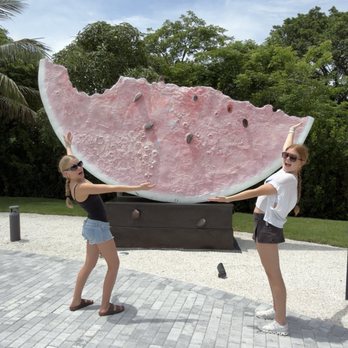 Nader Sculpture Park - us holding watermelon - Art Museums Near Me - Miami, Florida Nader Sculpture Park - us holding watermelon - Art Museums Near Me - Miami, Florida