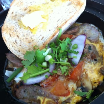 Cafe O-Mai - Clay pot baked eggs w. tamarind sauce and lemongrass pork sausage. - Vietnamese Near Me - Annerley, QLD