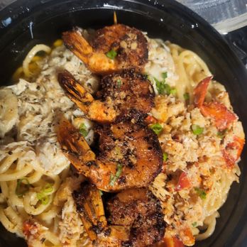 Chef Smelly's - Trifecta over garlic noodles. - Cajun/Creole Near Me - Oakland, California