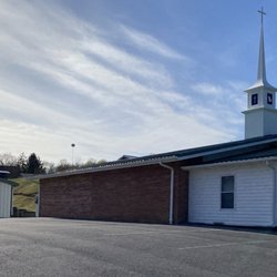 Free Pentecostal Assembly - Outside view of church and fellowship hall.