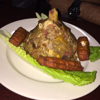 Sajhoma Restaurant - Mofongo with longaniza, chicharron and queso frito. They give you your choice of chicken or beef gravy on the side. - Dominican Near Me - Baltimore, Maryland Sajhoma Restaurant - Mofongo with longaniza, chicharron and queso frito. They give you your choice of chicken or beef gravy on the side. - Dominican Near Me - Baltimore, Maryland