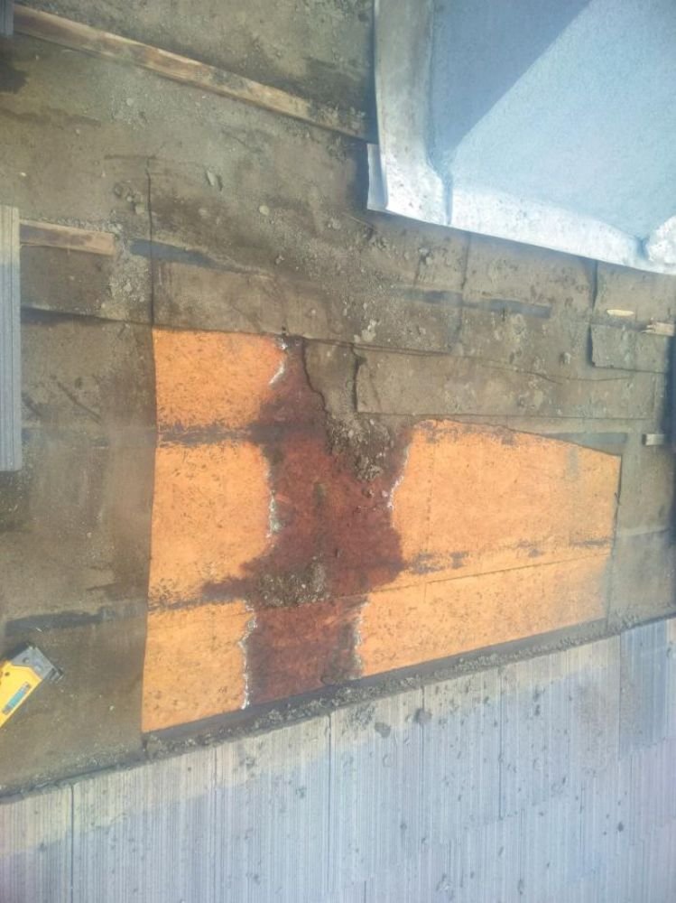 Slide of Earl Bennett Roofing