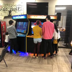 Goin' Gaming - This game was a ton of fun. The kids loved playing this competitive game together. And check out this giant Pac-Man game on the right!