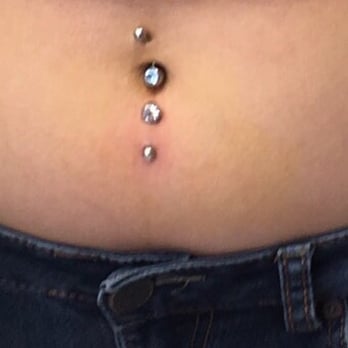 Screamin' Ink Tattoo - My inverse navel piercing was done here. (Don't mind the crooked top piercing, done at the boardwalk). - Tattoo Near Me - Fair Lawn, New Jersey