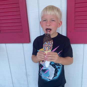 Spanky Oliver's Ice Cream - Ice cream with hard chocolate coat and rainbow sprinkles. - Ice Cream & Frozen Yogurt Near Me - Lyons, New York Spanky Oliver's Ice Cream - Ice cream with hard chocolate coat and rainbow sprinkles. - Ice Cream & Frozen Yogurt Near Me - Lyons, New York