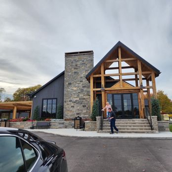 Baci Winery - a woman standing in front of a building - Wineries Near Me - Madison, Ohio Baci Winery - a woman standing in front of a building - Wineries Near Me - Madison, Ohio