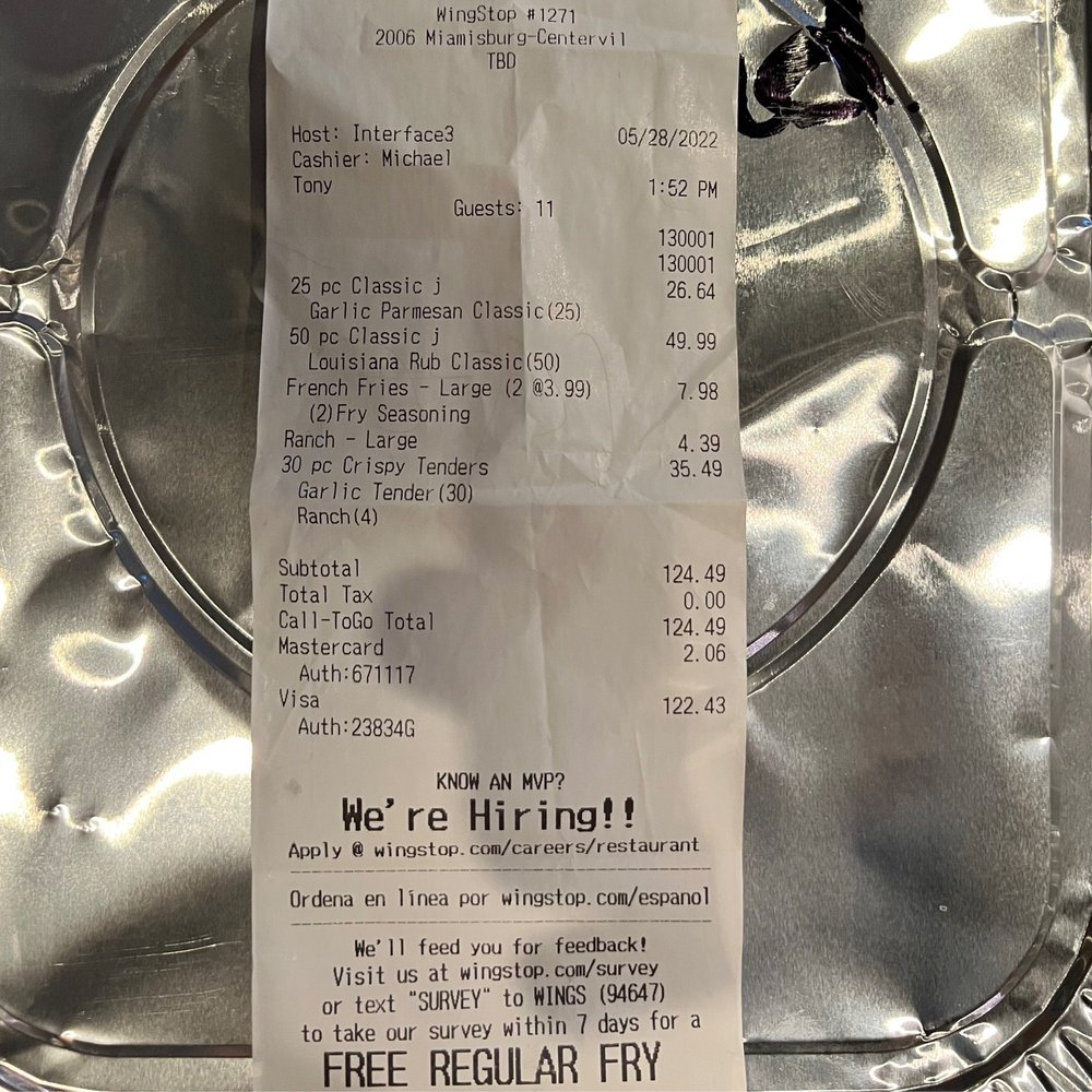 Wingstop - a receipt on a tray of food - Chicken Wings Near Me - Dayton, Ohio