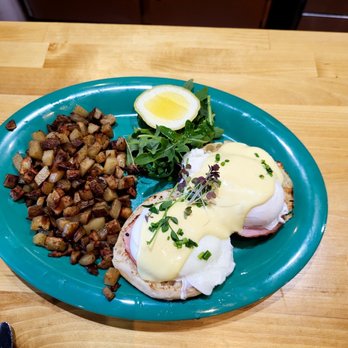 Naughter's - Eggs Benedict with greens and home fries. - Sandwiches Near Me - Troy, New York