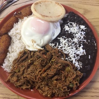 La Taguara - Pabellon a Caballo-shredded beef, rice, beans, fried plantain with a sunny-side up egg. - Venezuelan Near Me - Madison, Wisconsin