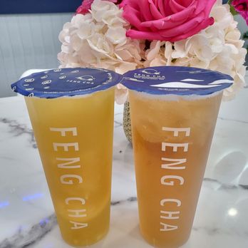 Feng Cha Teahouse - Citrus Lord on the left ($5.25) and Peach Oolong on the right ($4). 3/13/2022 - Bubble Tea Near Me - Costa Mesa, California