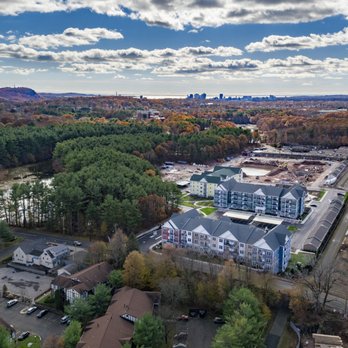 Canal Crossing - Canal Crossing at Whitneyville West with East Rock and New Haven in the background - Apartments Near Me - Hamden, Connecticut
