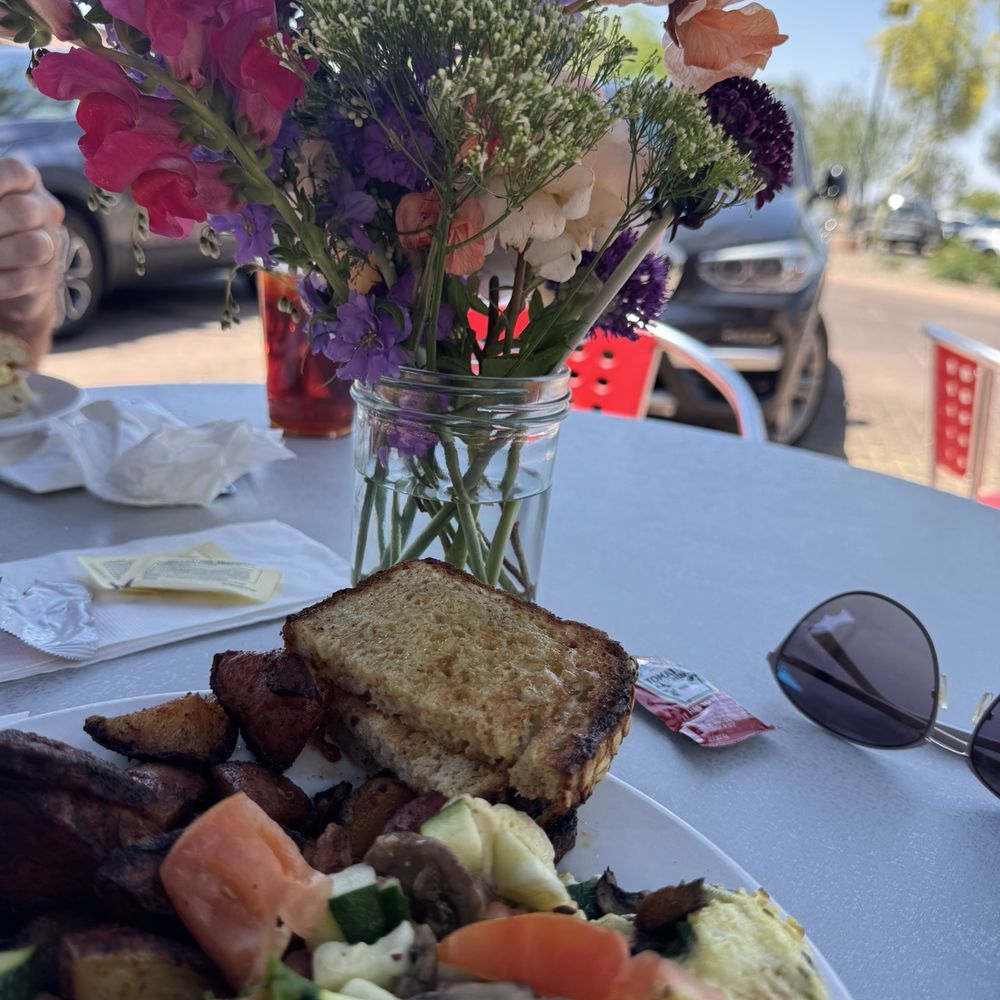 Veggie omelette with gluten-free toast and delicious roasted potatoes. Veggie omelette with gluten-free toast and delicious roasted potatoes.