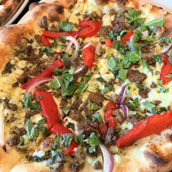 Mioposto - Vegan Cheese Pizza with meat - Italian Near Me - Seattle, Washington Mioposto - Vegan Cheese Pizza with meat - Italian Near Me - Seattle, Washington
