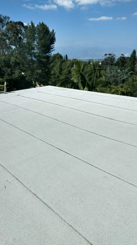 Slide of Magic Hands Roofing