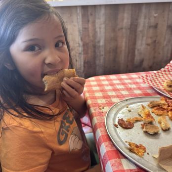 Gianna's Pizza - Baby girl and her cheese slice - Pizza Near Me - Las Vegas, Nevada