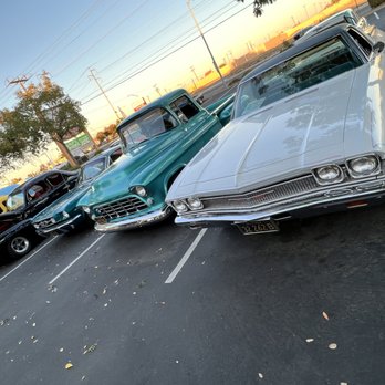 Burger Junction - a row of classic cars parked in a parking lot - Burgers Near Me - Sacramento, California Burger Junction - a row of classic cars parked in a parking lot - Burgers Near Me - Sacramento, California