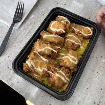 Chicky's - Garlic and Herb Chicky's Chicken Over Rice - Portuguese Near Me - Jamaica, New York