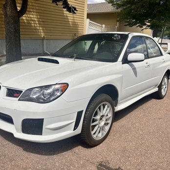 Hagerty - My clean 2006 Subaru STi in a rare visit outside of the garage. - Auto Insurance Near Me - Traverse City, Michigan Hagerty - My clean 2006 Subaru STi in a rare visit outside of the garage. - Auto Insurance Near Me - Traverse City, Michigan