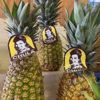 Gonzalez Fruit Market - three pineapples with stickers on them - Fruits & Veggies Near Me - Lyford, Texas