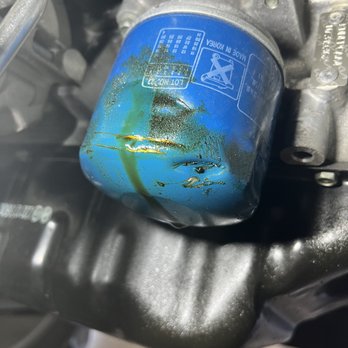 Mavis Discount Tire - The oil filter next to the oil pan leaking - Auto Repair Near Me - Denville, New Jersey Mavis Discount Tire - The oil filter next to the oil pan leaking - Auto Repair Near Me - Denville, New Jersey