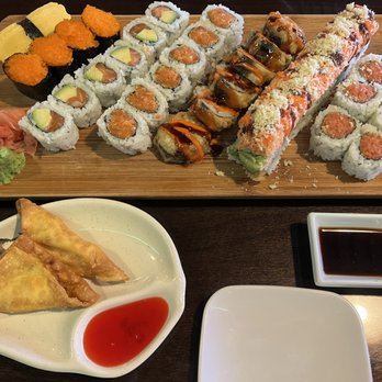 Sushi World - Crab Rangoon, egg and masago sushi, salmon avocado, Godzilla, spicy 2 in 1, spicy tuna - Japanese Near Me - Chicago, Illinois