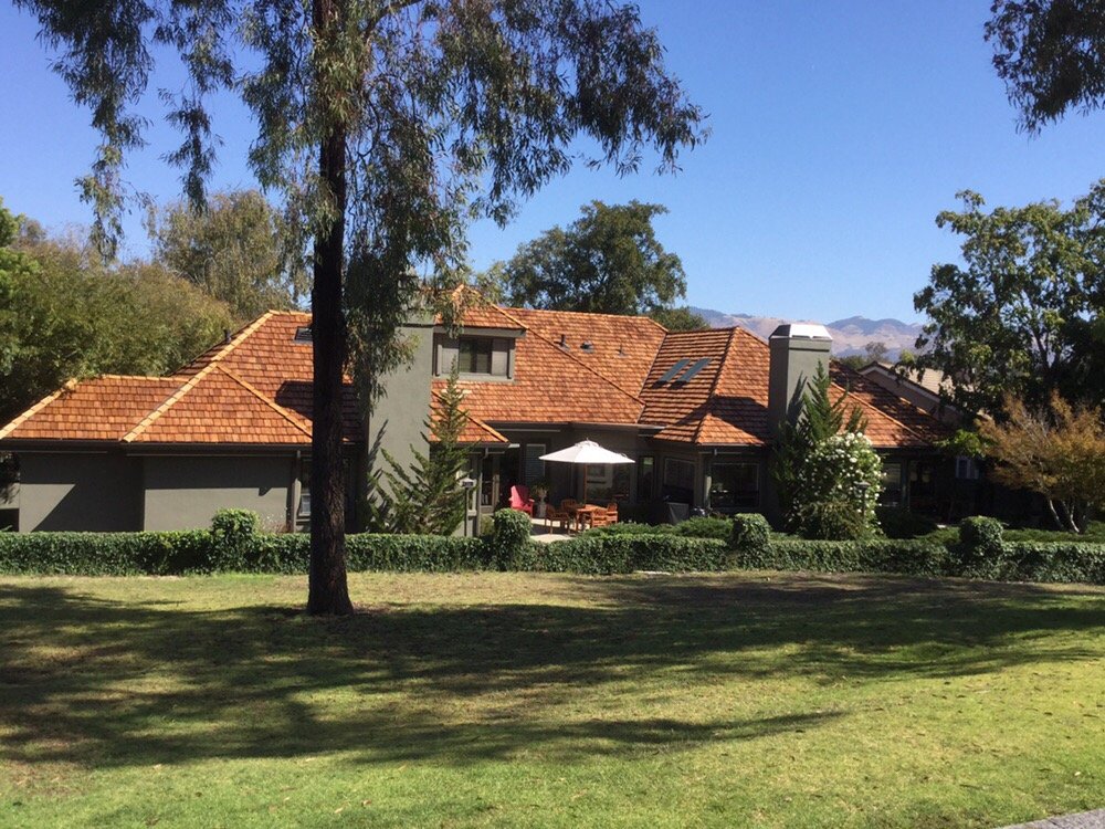 Slide of Wick's Roofing