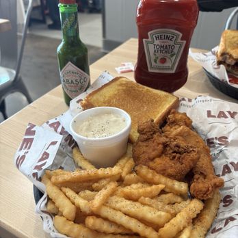 Layne's Chicken Fingers - 3 piece spicy (0 kick) with fries, gravy, and Texas Toast. - Chicken Shop Near Me - Leander, Texas